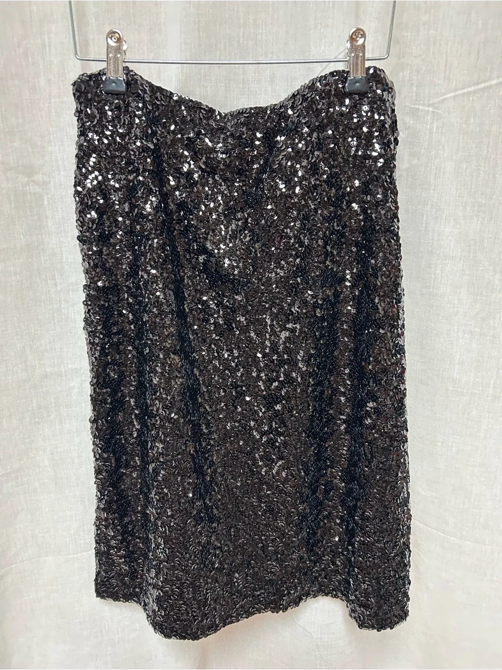 Black sequins formal pencil skirt appears all sequins in place. XL